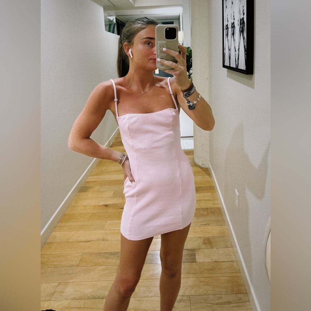 Light pink mini spaghetti strap dress (straps have silver hearts as a detail)